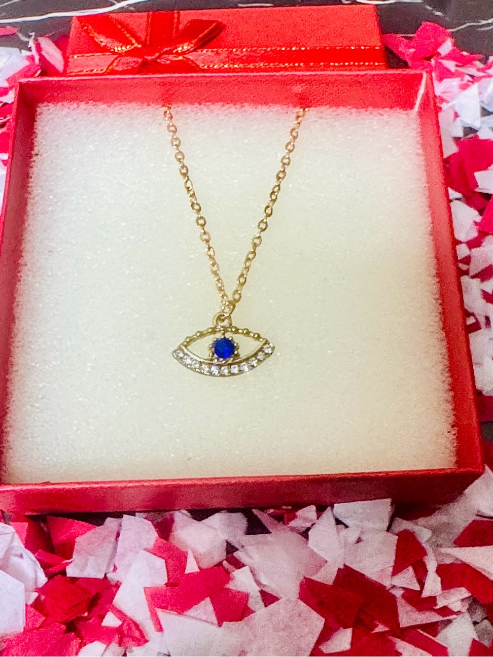 Gold Eye Pendant Necklace with Blue Center Stone